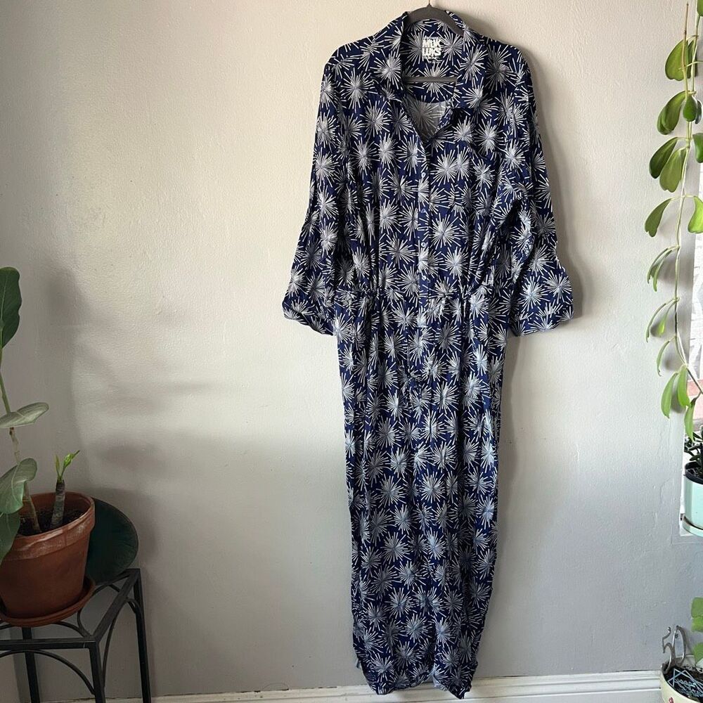 Muk Luks navy blue jumpsuit featuring a white starburst or firework print.